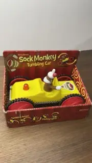 Sock Monkey Yellow Tumbling Toy Battery Operated Car