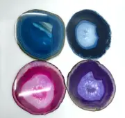 Coasters Made Of Natural Stones Of Different Colors Pink Blue Purple minerals