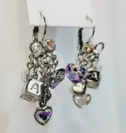 Kirks Folly Authentic Signed Earrings Dangle Million Dollar Baby Silvertone