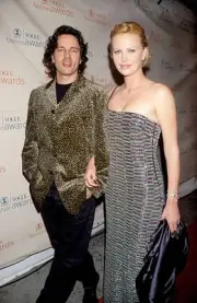 Stephan Jenkins and Charlize Theron during 1999 VH1 Vogue Fashion - Old Photo
