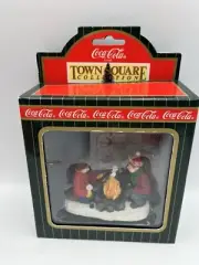 Coca-Cola Town Square Collection Kids toasting marshmallows