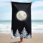 Beach towel - Snowy pine trees under the moonlight