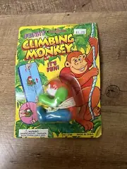 Vintage Plastic Climbing Monkey Toy