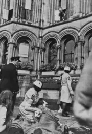 The FA Cup is brandished out of a Manchester Town Hall window while - Old Photo
