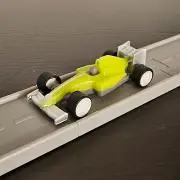 Neon Formula 1 F1 Racecar NEW Road To Gold Driven Battat Pocket Micro Toy Car
