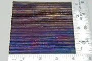 0100.48 - 4" x 4" IRIDIZED PRIZMATIC TEXTURE ON BLACK BULLSEYE 3mm GLASS 90 COE