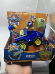 Paw Patrol DINO RESCUE Chase Deluxe Rev Up Vehicle & Figure with Mystery Dino ST
