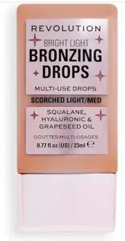 Revolution Bronzing Drops Beauty Bright Light (Scorched Light/Medium) SEALED NEW