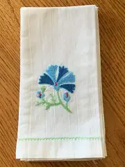 Four Guest Hand Towels with hand-embroidered Lotus flower in blues