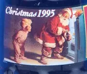 1995 Christmas Santa w/ little boy peeping in fridge No Deposit Coke Bottle 8oz