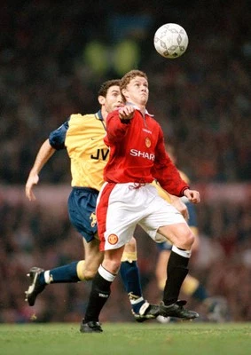 Ole Gunnar Solskj�r of Manchester United is tracked by Martin Keow- Old Photo