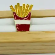 Classic French Fries Enamel Pin - A Tasty Treat for Fashion and Food Lovers!