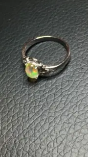 #40B-.50ct Genuine Ethiopian Welo Opal set in a 925 Sterling Silver Size 7 Ring