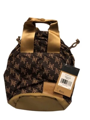 The North Face Never Stop Mini Backpack Utility Brown TNF Monogram New w/tag