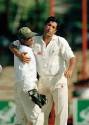 Wasim Akram and Rashid Latif of Pakistan celebrate during the- Old Cricket Photo