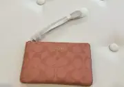 coach wristlet pink