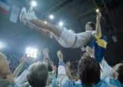 Stefan Edberg of Sweden is lifted by his team mates as they celeb - Old Photo 1