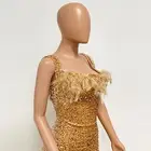 Unique Womens Evening Gown with Feathered Details and Sparkling Sequin Finish