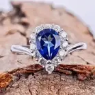 Lab Created Crown 1.40CT Pear Sapphire & Round White Engagement Ring 935 Silver