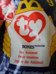 McDonald's "Bones" beany baby dog still in original unopened package. #9