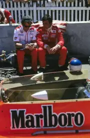 Patrick Tambay talks with a McLaren engineer whilst sat on an- 1978 Old Photo