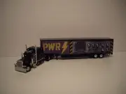 DCP FIRST GEAR 1/64 AC/DC PWR/UP PETE 389 WITH SLEEPER WITH KENTUCKY MOVING VAN
