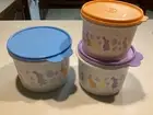 BRAND NEW SET OF THREE TUPPERWARE STACKING EASTER CANISTERS WITH SEALS