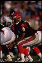 Quarterback Jeff Blake Cincinnati Bengals crouches for the snap- 1995 Old Photo