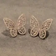 BELLA LUCE WHITE DIAMOND SIMULANT RHODIUM OVER STERLING SILVER CLIP EARRINGS