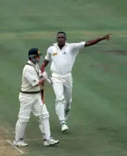 Australian batsman Mark Waugh is dismissed by bowler Devon Ma- Old Cricket Photo