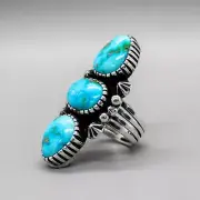 NAVAJO-LARGE STERLING SILVER AND TURQUOISE RING by JACOB UTZLER-SIZE 9