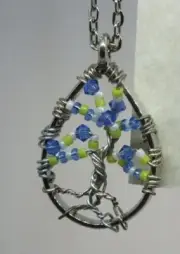 E037 Tree of Life in a teardrop dreamcatcher ring on 10" chain