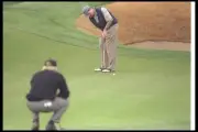 Scott Hoch watches Greg Norman putt the ball at the Andersen Consu- Old Photo