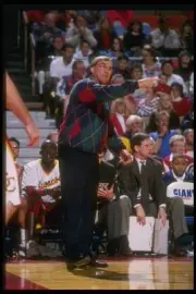 Santa Clara Broncos head coach Dick Davey looks on the Fresno Stat- Old Photo
