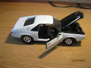 1/18 1969 AMC AMX IN M.WHITE/BLACK, 1 OF 5000 PIECES-ERTL/AMER. MUSCLE #33441