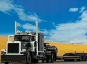 1/64 DCP PETERBILT 389 TRI AXLE & FONTAINE MAGNITUDE LOWBOY TRAILER