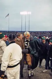 Bob Hyland of the Green Bay Packers walks off the field against th- Old Photo