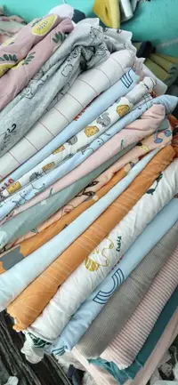 在飛比找淘寶網優惠-清倉處理各式優質外貿純棉布頭diy童裝布純棉莫代爾萊卡布料尿