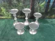 KRINGLE EXPRESS SET OF FIVE GRADUATED PEDESTALS CANDLE HOLDERS