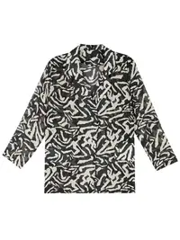 在飛比找樂天市場購物網優惠-2020夏季新款復古小眾設計感豹紋印花防曬襯衫女士洋氣中長款