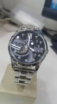在飛比找Yahoo!奇摩拍賣優惠-[永達利鐘錶 ] 東方錶 ORIENT 銀色黑面星月鏤空機械