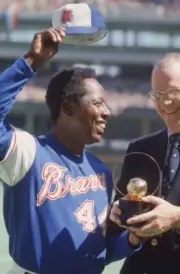 Closeup of Atlanta Braves Hank Aaron with commissioner Bowie Kuhn - Old Photo