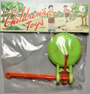 vintage plastic 1960s dime store toy, Colorful Noise maker w illustrated card