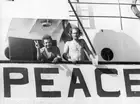 Middle East peace activist Abbie Nathan stands with a volunteer sa - Old Photo