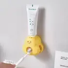 Plastics Toothpaste Dispenser Automatic Toothbrush Holder Toothpaste