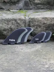 4.9" / 3.1" RM quad set four fins, black on natural Pro Glass. FCSII compatible.