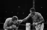Larry Holmes Throws A Punch Against Randall Cobb 2 Old Boxing Photo