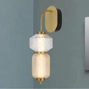 Torso Indoor LED Wall Light in Black or Brass