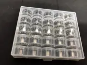 Bobbin case with 25 metal bobbins