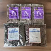 Lot of (1) Dried Cranberries , (3) Fig Pieces and (1) Dried Blueberries.